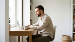Man reviewing his Get Gambit virtual testosterone assessment on a laptop at home